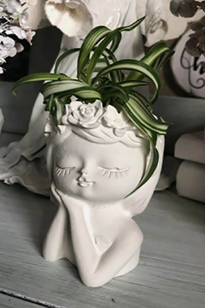 مزهرية كونكريت على شكل وجه